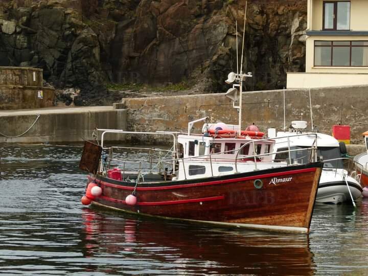 Carvel built wooden Iroco